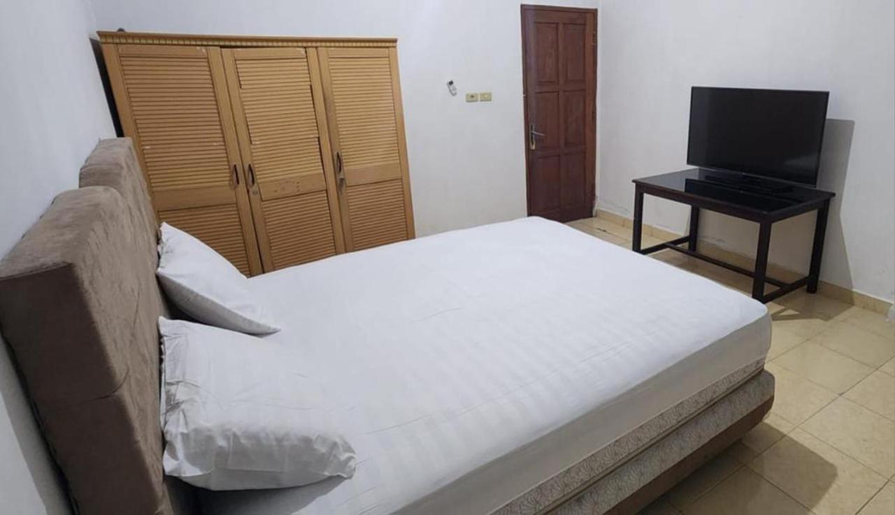 Permata Homestay Kotamobagu Mitra Reddoorz Kültér fotó