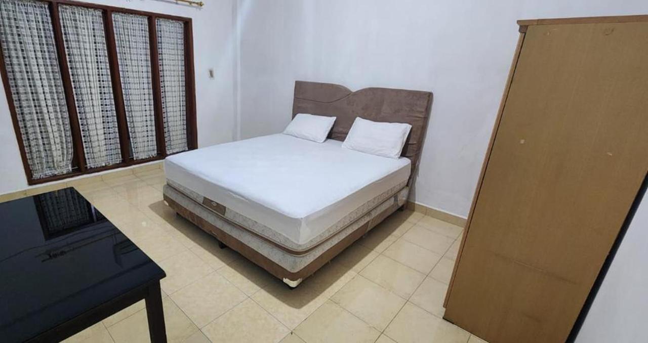 Permata Homestay Kotamobagu Mitra Reddoorz Kültér fotó