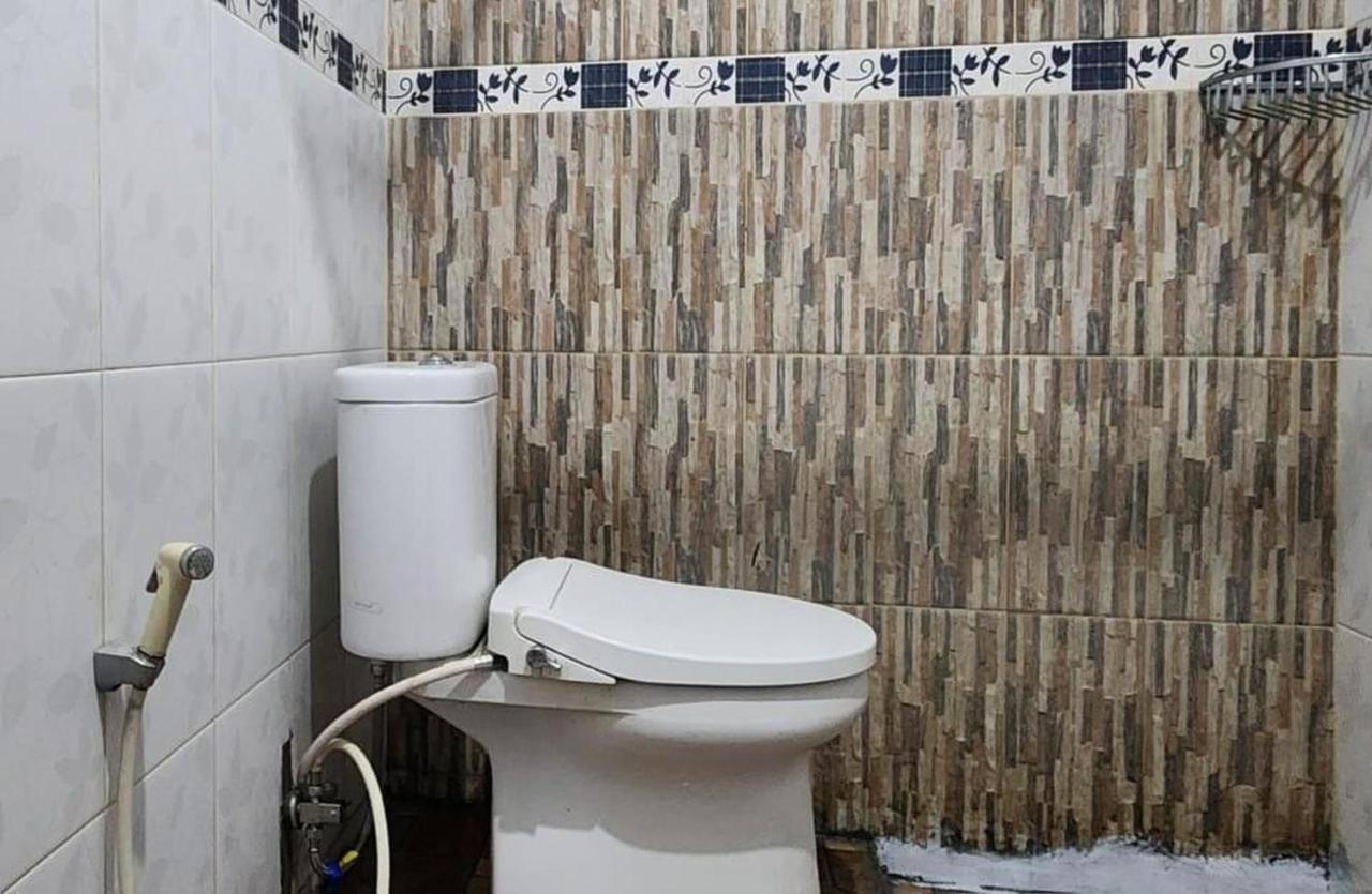 Permata Homestay Kotamobagu Mitra Reddoorz Kültér fotó